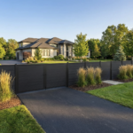 Black Composite fence single gate and a double gate in backyard driwave