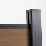 Brown walnut wood grain composite fence with black metal posts, durable and stylish, ideal for NJ homes.