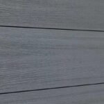 Light gray composite fence with staggered horizontal planks, durable and stylish, perfect for NJ homes.