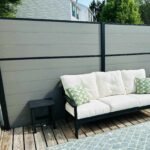 Silver gray composite fence with sleek co-extrusion design, perfect for NJ decks, offering privacy, durability, and modern